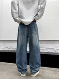 بنطال جينز أميري واسع بستايل ستريت وير وغرافيتي (Amiri Baggy Jeans)
