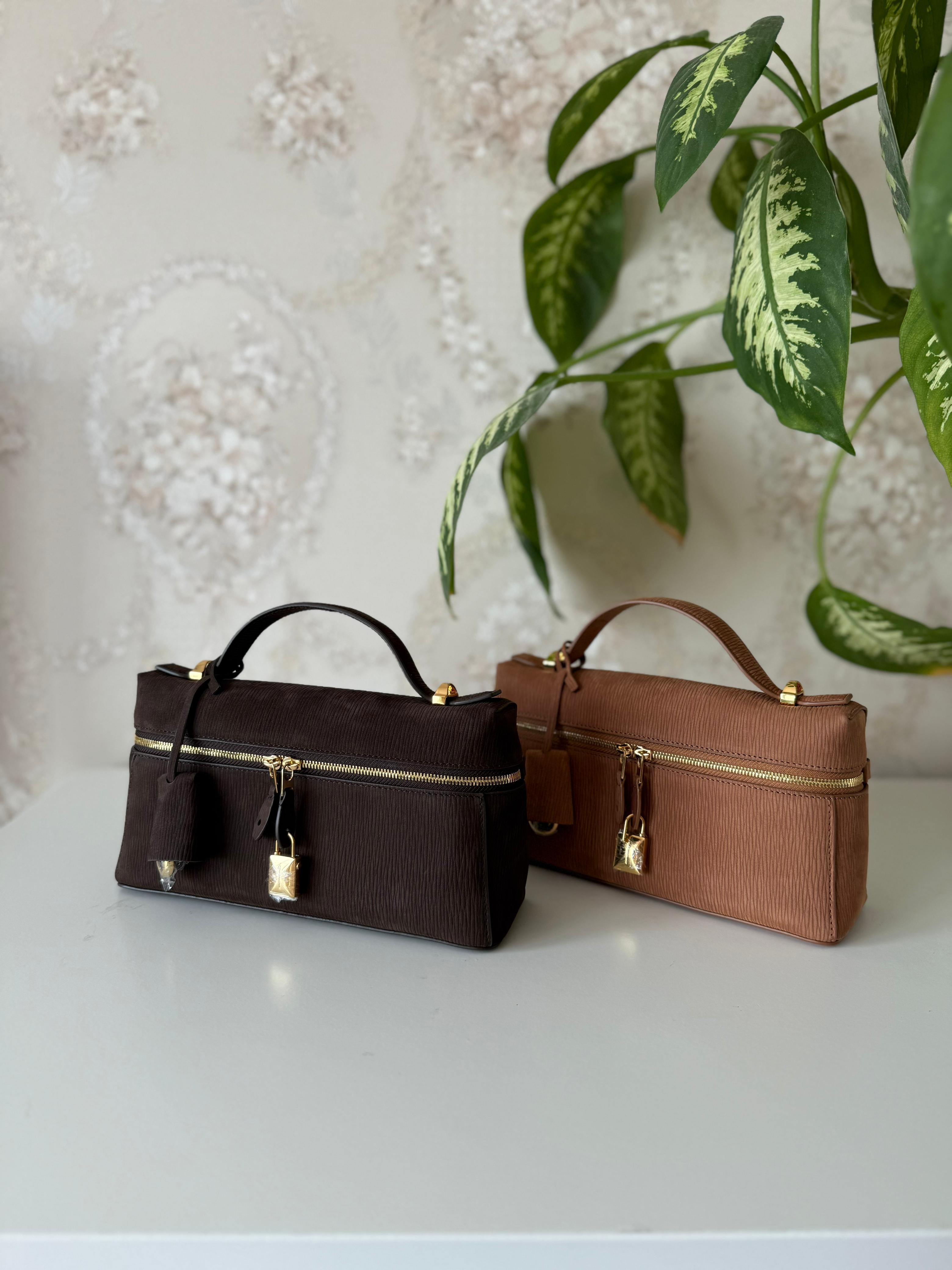 Elegant women's handbag with a luxurious logo print, high quality – distinctive modern design